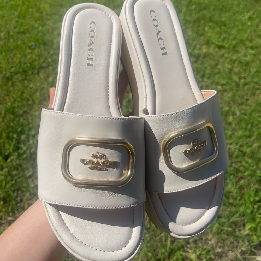 Coach Eloise Sandal in the color cream/beige